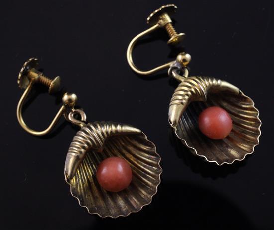 A pair of late Victorian gold and coral set shell shaped ear clips, 0.75in.